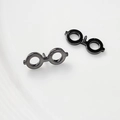 Detailed view of minimalist round-frame eyewear stud earrings in dark gunmetal finish - Gunmetal