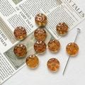 Macro shot of amber glass beads with etched moon and star motifs for DIY jewelry craft - 1 Piece Pack / Amber (6#)