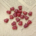 Macro shot of red bell-shaped glass beads for DIY jewelry making on vintage paper - Dark Red Style (17#)