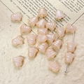 Detailed macro view of pink bell-shaped glass beads with gold stripes for DIY jewelry making - Pink Three Lines Style (22#)