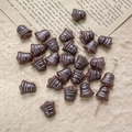 Macro view of vintage bronze-tone bell-shaped Czech glass beads for DIY jewelry making - Bronze Brown Style (29#)