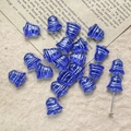 Macro detail of blue Czech glass bell beads with silver stripes for DIY jewelry making - Dark Blue Silver Pattern Style (28#)