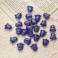 Macro shot of blue bell-shaped Czech glass beads with gold stripes for DIY jewelry - Dark Blue Bell Style (31#)