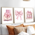 Three-piece set of pink bow posters with books and flowers on a bedroom wall - 30x40cm / Style 24Y20836 (With Wood Frame)