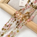 Close-up of polished oval natural stone beads in amber and pink for jewelry making - 1 Piece / Light Pink Amber Style (1#)