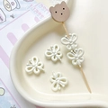 Detailweergave van vijf crèmewitte vlinderkralen van legering voor doe-het-zelf sieraden - 1 Stuk / Crèmewit (1#)
