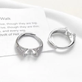 Close-up of adjustable silver-plated ring bases with cubic zirconia stones for DIY pearl jewelry - White Gold