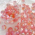 Macro view of iridescent light pink aurora acrylic beads for DIY jewelry making - Peach Pink (2# Single Price)