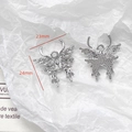 Detailed view of butterfly pendant with water drop stone and silver finish charms - Silver Pave Butterfly Pendant (5#)