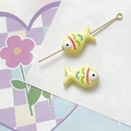 Detailed view of yellow hand-painted fish beads with colorful stripes for DIY jewelry making - Yellow Style (5#)
