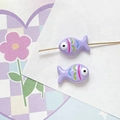 Macro detail of two purple hand-painted fish beads on a gold wire for DIY jewelry making - Purple Style (8#)