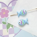 Detailed macro view of two light blue ceramic fish beads with colorful hand-painted scales - Light Blue Style (7#)
