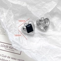 Close-up of 16mm heart-shaped silver metal pendants with black stone and hammered texture - Black Gem Heart Pendant (22#)