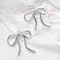 Detail of silver bow pendant for DIY jewelry with dimensions 32mm by 31mm - Simple Polished Bow Charm (37#)