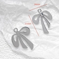 Detailed close-up of 24x31mm silver metal bow charms for DIY jewelry making - Wide Bright Silver Bow (38#)