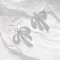 Silver metal bow charms for DIY jewelry making with dimensions 24mm and 31mm - Curved Ribbon Bow Charm (39#)