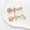 Close-up of 18k gold plated camellia flower pendants with pink enamel and zircons - Pink Style (Model 2, 18k Gold, Price per Unit)