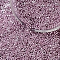 Macro view of light purple metallic glass cylinder beads for DIY jewelry making - Style 2