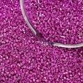 Macro shot of metallic rose pink glass delica beads for DIY jewelry making and weaving - Style 6