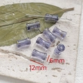 Dettaglio macro di perline di vetro viola 12x6mm con foglia d'oro per gioielli fai da te - 7# Tamburo a vita con foglia oro (12mmx6mm) / Set da 20 Pezzi / Lavanda