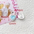 Macro view of light blue heart-shaped crystal pendants showing 16mm and 12mm dimensions - Light Blue Crystal Heart Style