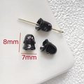Macro detail of 8x7mm black ghost charms with pink cheeks for DIY jewelry making - Black Cartoon Ghost Bead (8x7mm)