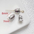 Macro shot of 8x7mm silver ghost charms with pink enamel eyes for DIY jewelry making - Silver Metal Ghost Bead (8x7mm)