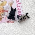 Detail of 23x11mm black resin bunny pendant with heart-shaped hollow metal back - Black Cartoon Bunny Style