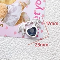 Detailed macro view of heart pendant with blue gemstone and bat wings, 23mm x 17mm - Bat Wings Blue Heart Style
