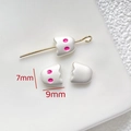 Macro detail of 7x9mm white ghost beads with pink dot eyes and gold pin for DIY jewelry - White Mini Ghost (9x7mm)