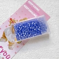 Close-up of 3mm matte blue cat eye glass beads for DIY jewelry in a plastic box - Frosted Dark Blue (5#)