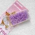 Close-up of 3mm purple cat-eye glass beads in a storage box for DIY jewelry making - Pearlescent Purple (7#)