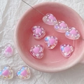 Macro view of iridescent pink heart beads and a crafting needle in a pink bowl - 2# Pink and White