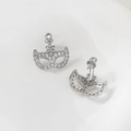 Detailed view of silver masquerade mask stud earrings with micro-pave cubic zirconia - Silver