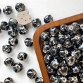 Macro shot of handmade faceted ceramic beads with brown and blue reactive glaze for DIY jewelry - Dark Brown Flow Glaze Multifaceted Style (6#)