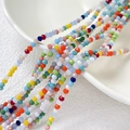 Vue macro de perles en verre facettées colorées pour colliers et bracelets DIY - 120 pcs/rang (3,5 mm) / Mélange Arc-en-ciel Vibrant (4#)