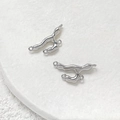 Macro detail of liquid metal style silver-plated three-ring connectors for DIY jewelry making - Platinum Color 4-Ring Lava Connector (4)