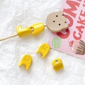 Detailed view of yellow smiley face beads and wooden bear charm for DIY jewelry making - 1 Piece / Yellow