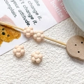 Close-up of cream daisy resin beads for DIY bracelets and handmade jewelry making - Cream Flower (19#)