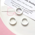 Close-up of three mini white macaron floral beads for DIY jewelry making accessories - White Round Ring (1#)