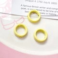 Detailed macro view of yellow macaron floral spacer beads for DIY jewelry making crafts - Light Yellow Round Ring (4#)