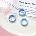Macro detail of light blue mini donut beads for DIY jewelry making on a vintage card - Light Blue Round Ring (5#)
