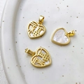 Macro view of 14k gold-plated heart charms with natural shell and Fu character inlay - Golden Heart-Shaped Good Fortune Style (No. 1, 18K, Single Piece)