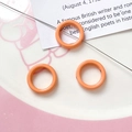Macro detail of glossy bright orange round hollow beads for DIY jewelry making - Orange Round Ring (7#)