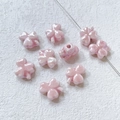 Macro detail of pink pearlescent clover ceramic beads for DIY handmade jewelry crafts - 1# Pink Clover