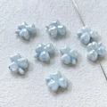 Macro detail of iridescent light blue ceramic clover beads for DIY jewelry making - 2# Light Blue Clover