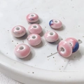 Macro detail of handmade floral ceramic beads with pink and blue glaze for DIY jewelry - Pink Kiln Change (2#)