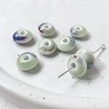 Macro view of handmade ceramic beads with natural blue and purple kiln glaze for DIY jewelry - Light Green Kiln Change (4#)