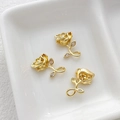 Macro shot of 14k gold-plated rose pendants with white zircons for DIY jewelry making - 18k Gold Plated Rose Style
