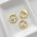 Macro view of 14k gold plated Little Prince charms with zircon sun and star patterns - 18k Gold Plated Sun Star Style